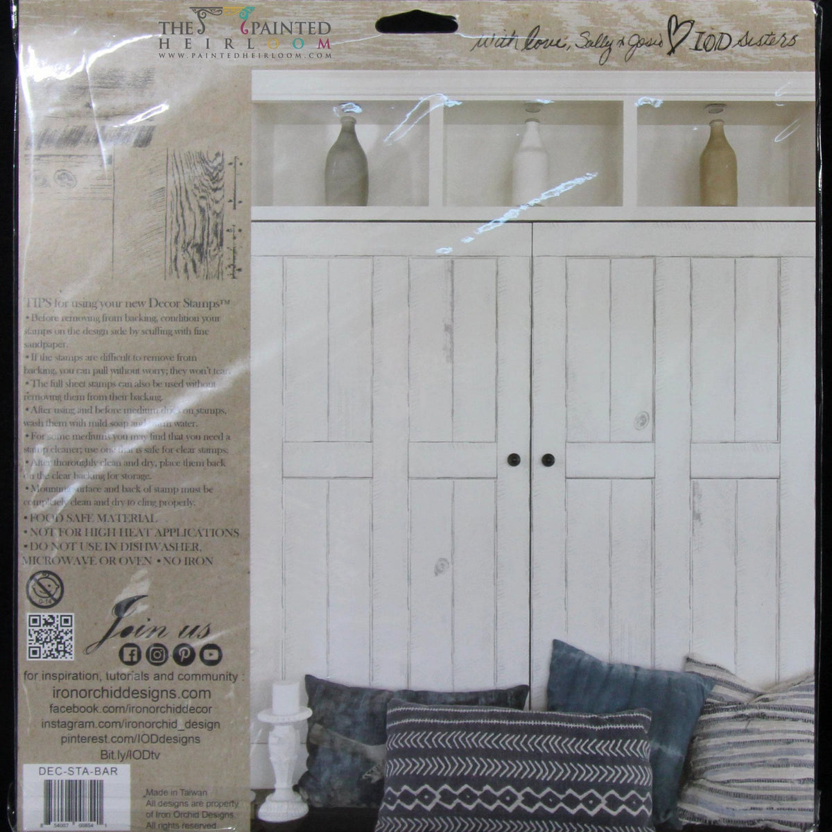 White wooden doors, blue-gray pillows, and I.O.D. Barnwood Planks Stamp in one package.