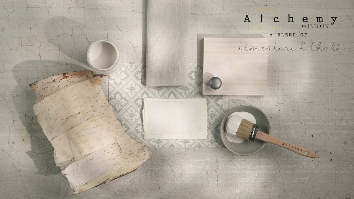 Birch Alchemy Paint by Fusion Mineral Paint sample, paintbrush, can, bark, and fabric swatch grouped together.
