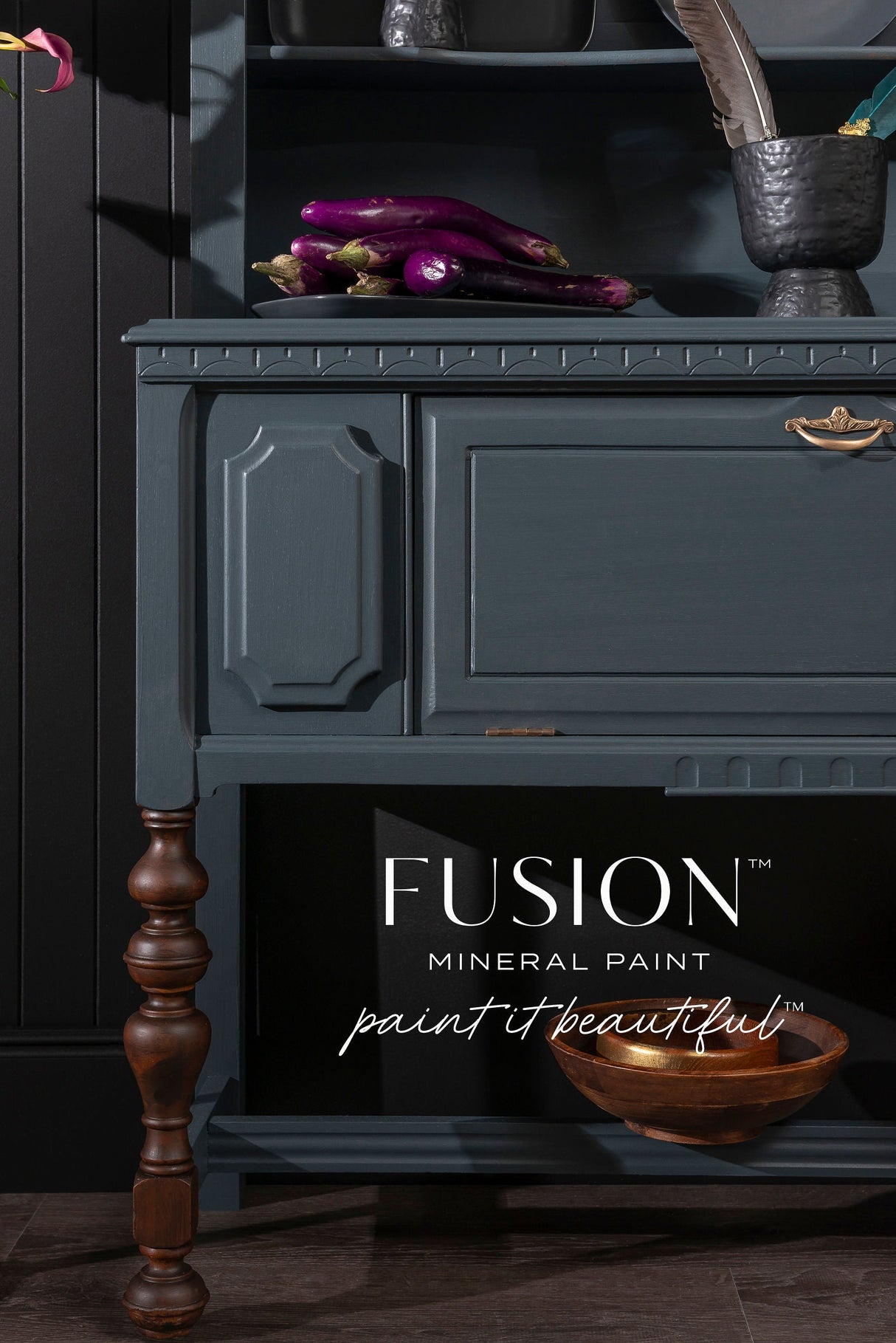 Teal cabinet with wooden legs, eggplants, and Fusion Mineral Paint Cambridge in dark blue.
