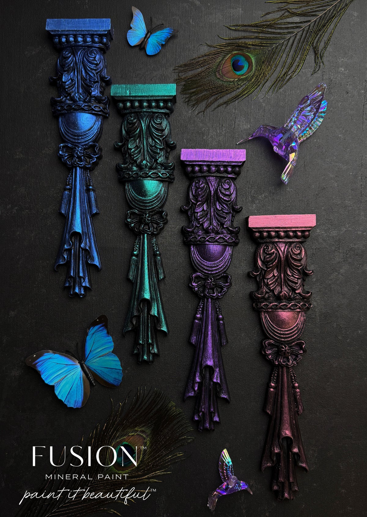 Set of four wood appliques with butterflies and feathers, painted in blue, green, purple, and magenta ChromaFlex.