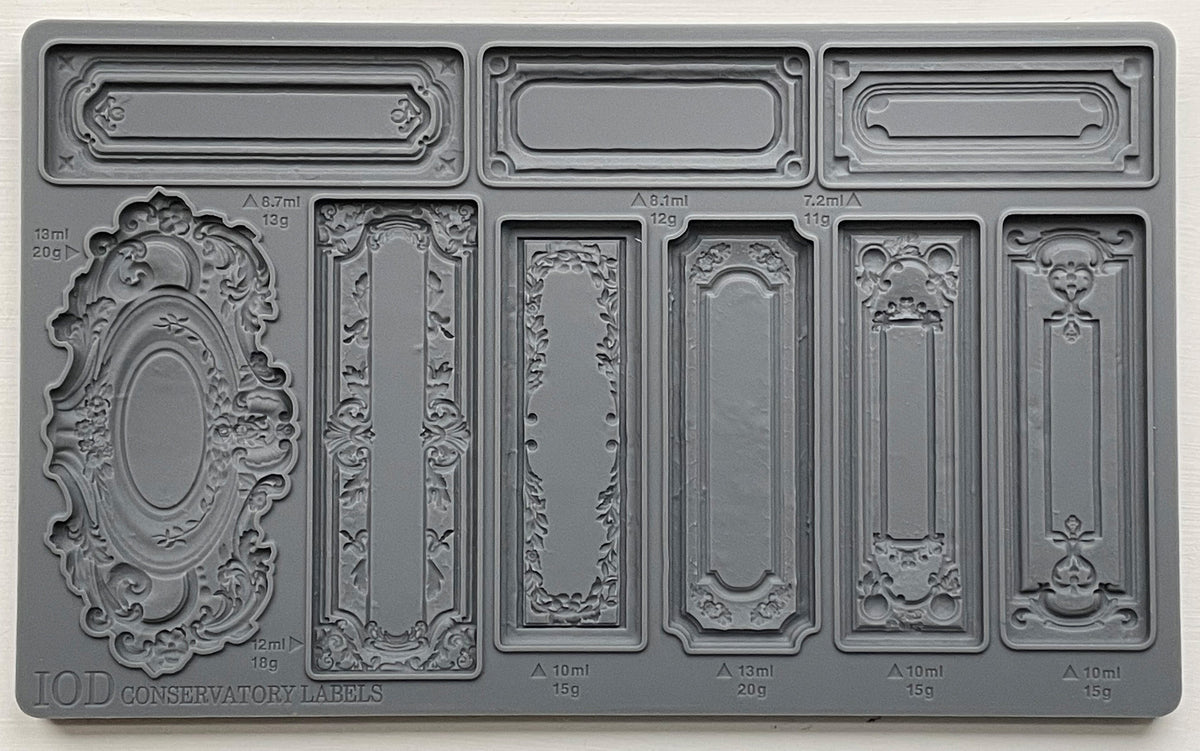 Conservatory Labels Mould by I.O.D. featuring 8 ornate, vintage-inspired label designs for crafts and décor projects.