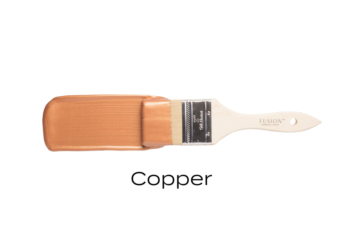 Paintbrush with Copper Metallic Fusion Mineral Paint on bristles; “Copper” text displayed below.