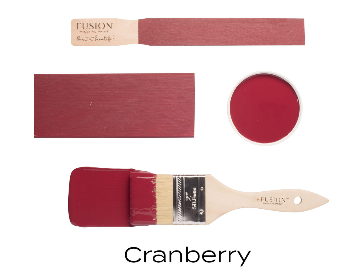 Cranberry Fusion Mineral Paint shown as swatch, on wood, in can, and on brush.