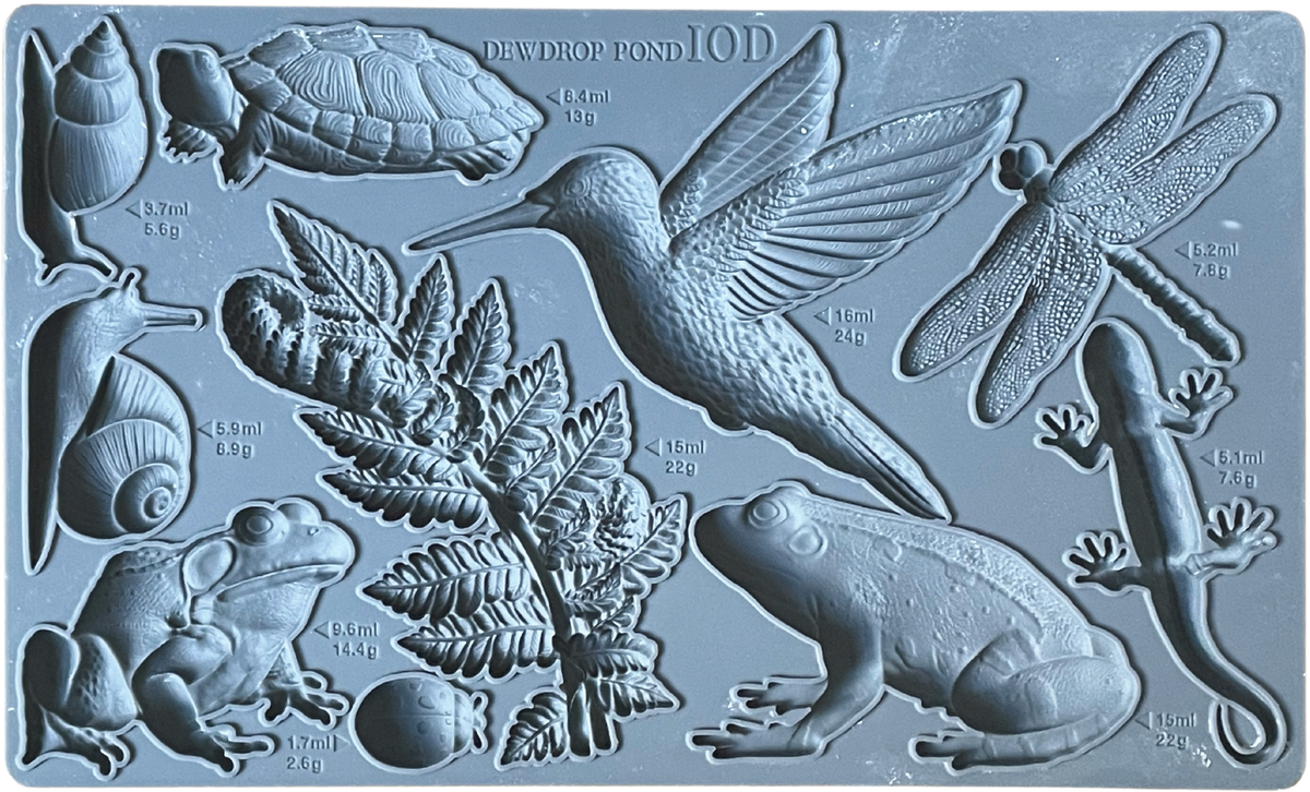 Gray animal and plant shapes made with Dewdrop Pond Mould by IOD or similar moulds.