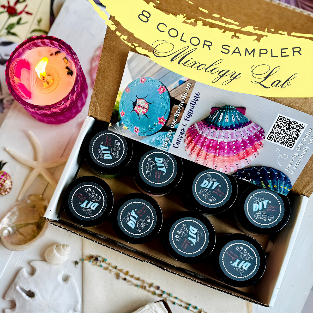 DIY Paint Co. 8-Color Mixology Lab Sampler (2025 Summer) open with paints, next to a candle and seashells.