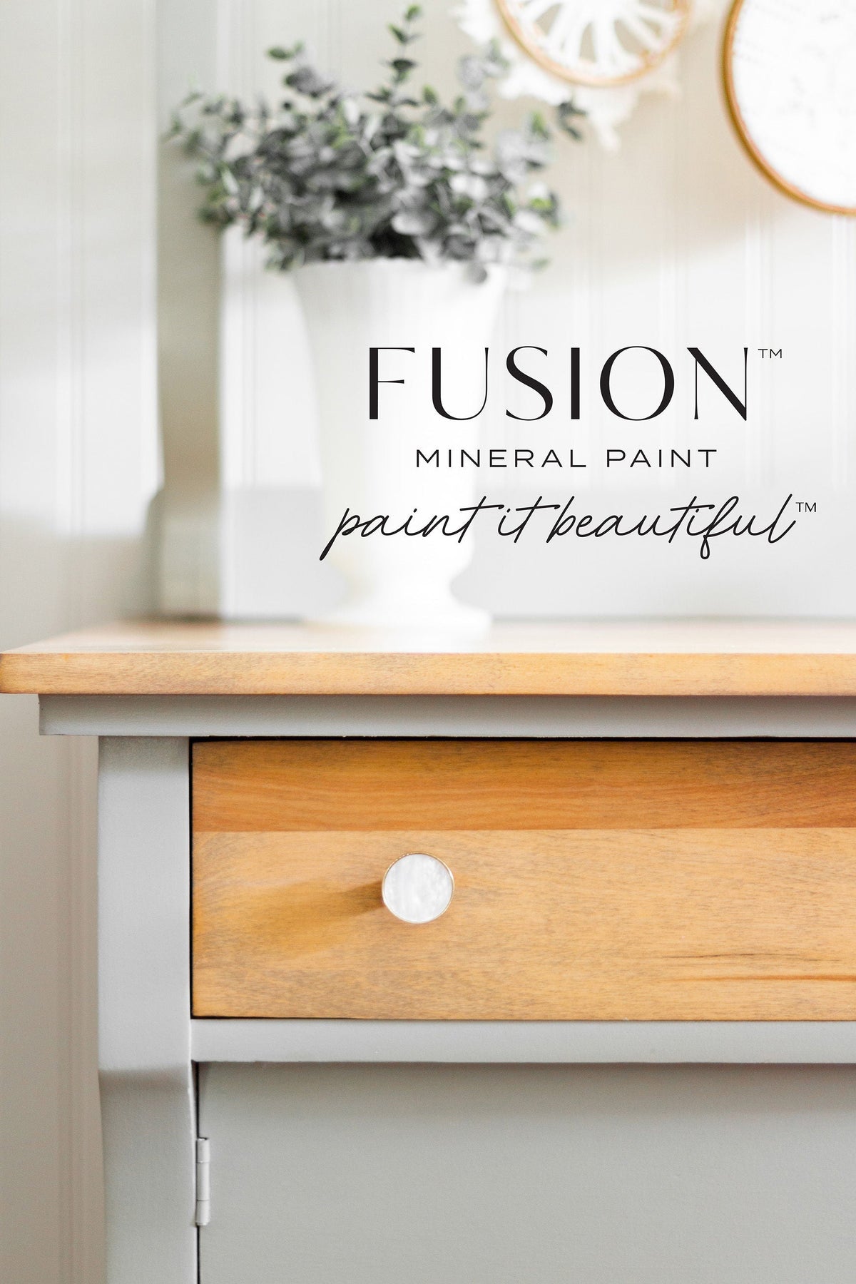 Fusion Mineral Paint—Eucalyptus text, wooden drawer with round knob, and white vase holding eucalyptus.