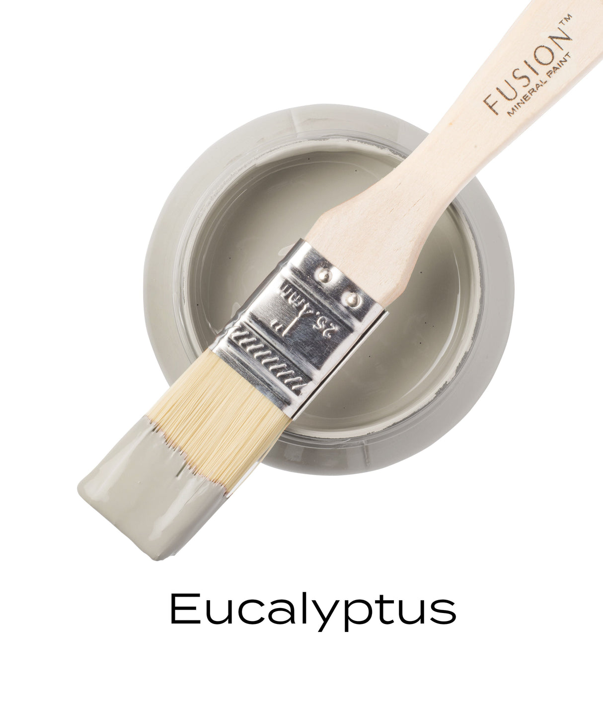 Open jar of Fusion Mineral Paint Eucalyptus, muted green shade, with brush dipped and resting on the rim.