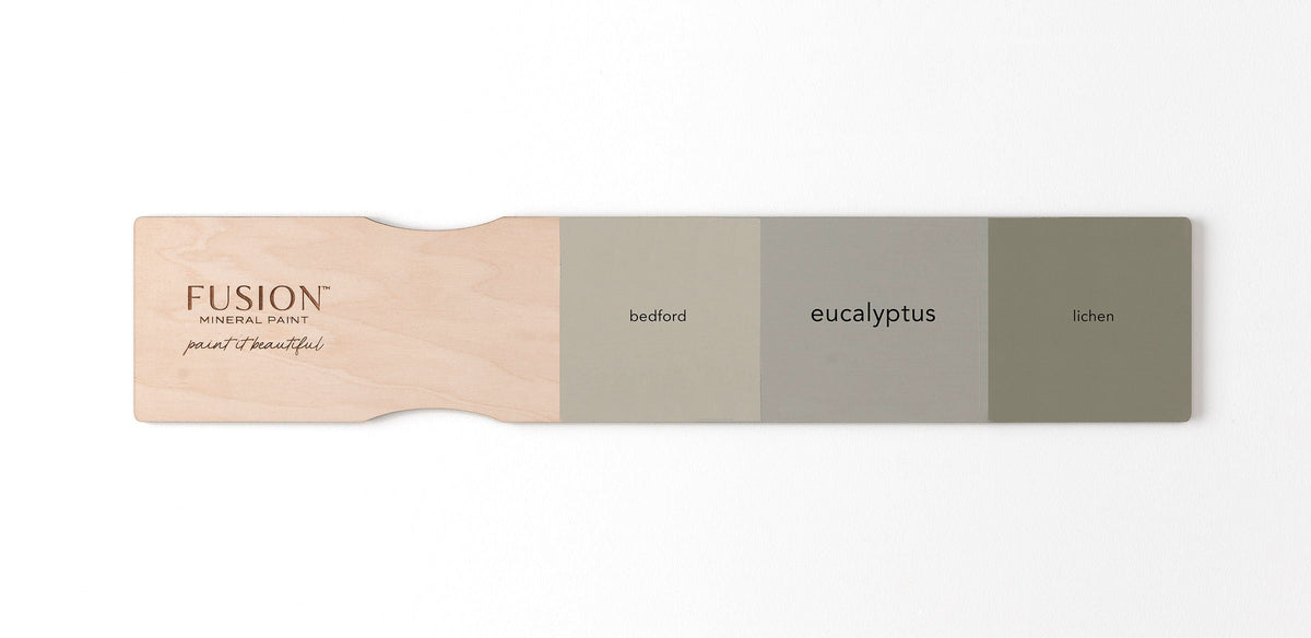 Three Fusion Mineral Paint swatches: Bedford, Lichen, and Eucalyptus displayed on a wood board.