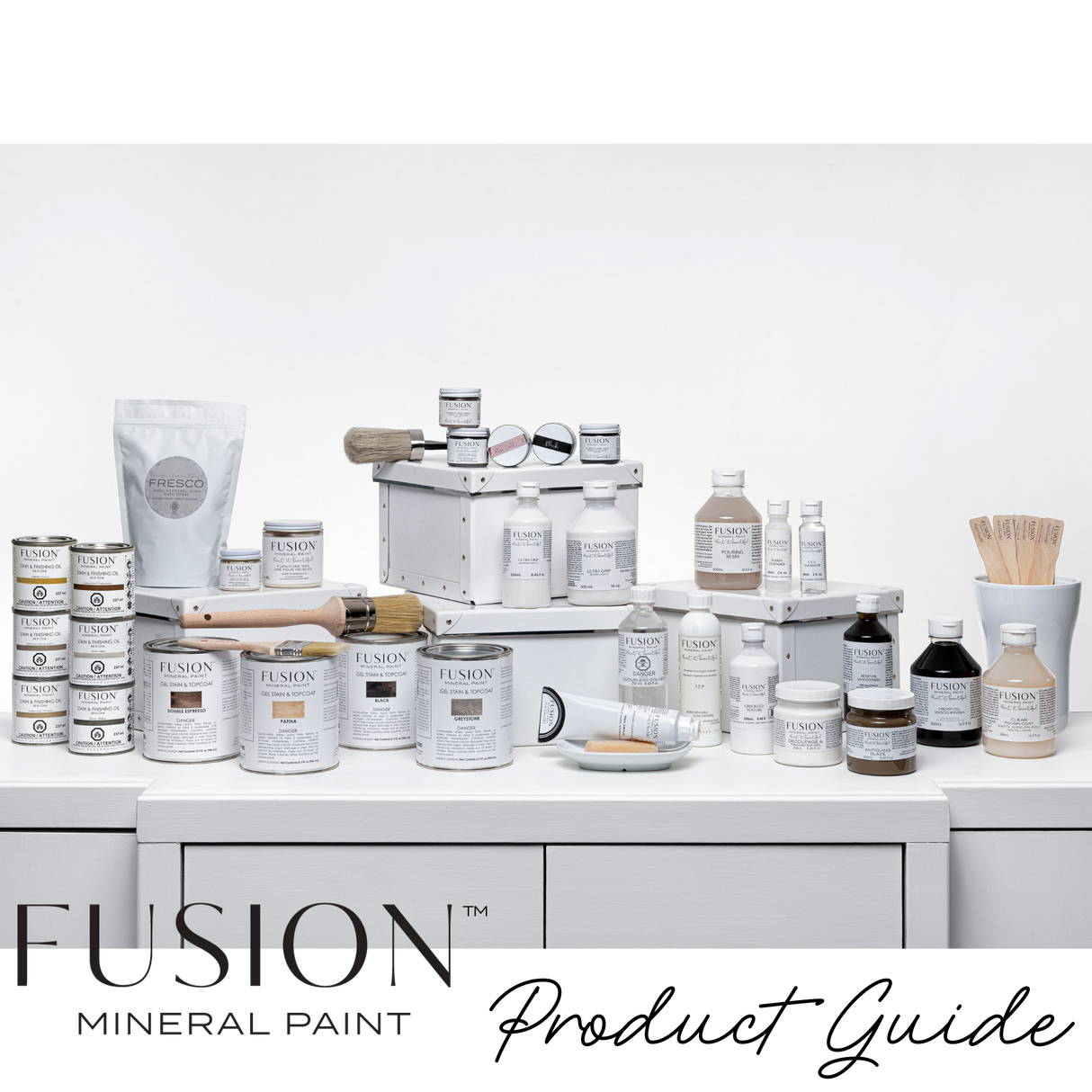 Fusion Mineral Paint Product Guide displayed on white tables with a plain white background.