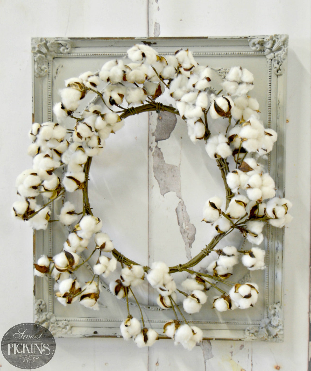 Cotton wreath displayed against wall painted with Old Fashioned Milk Paint’s Haberdash – Sweet Pickins Milk Paint.