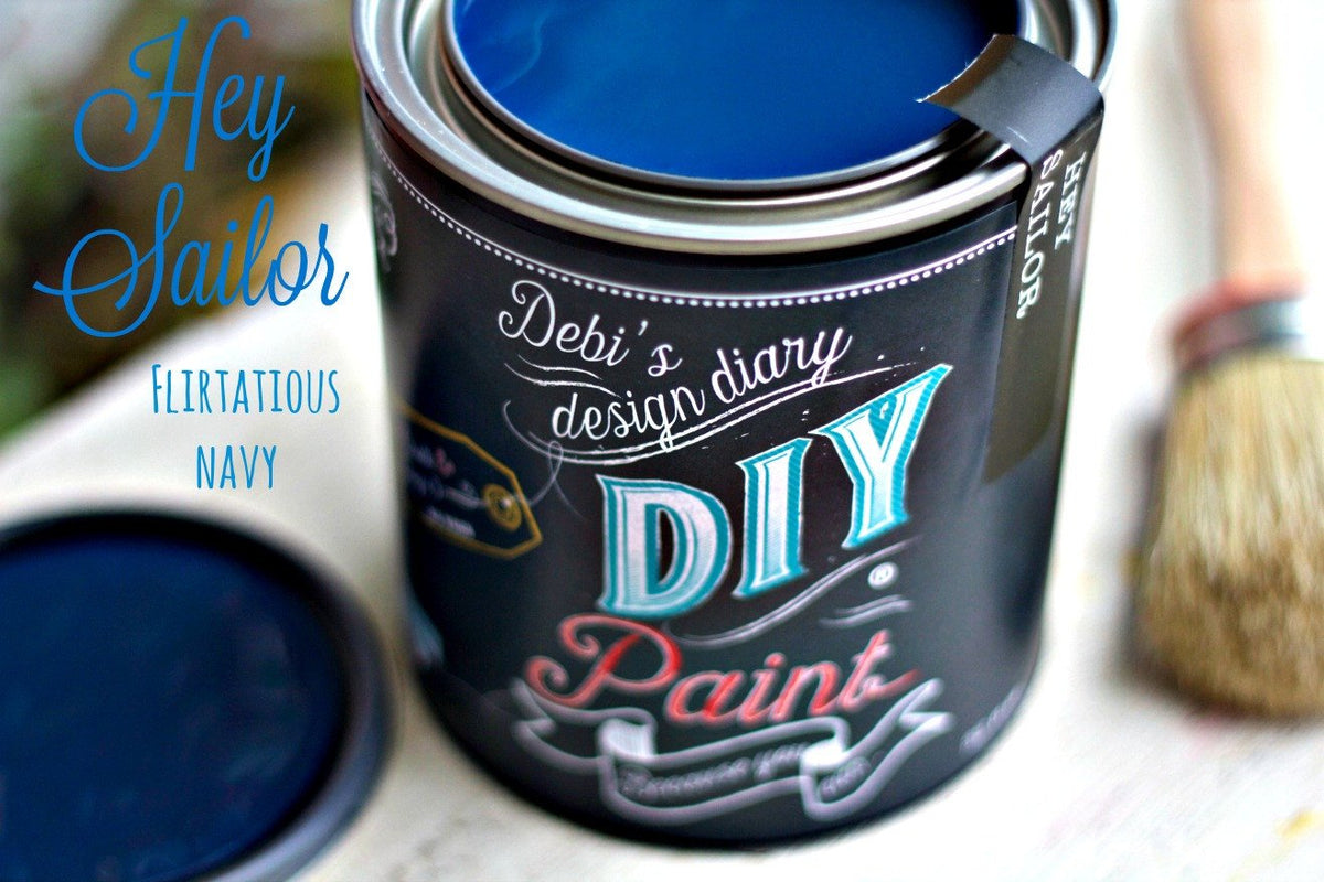 Open can of Hey Sailor DIY Paint by DIY Paint Co., with brush and lid shown.