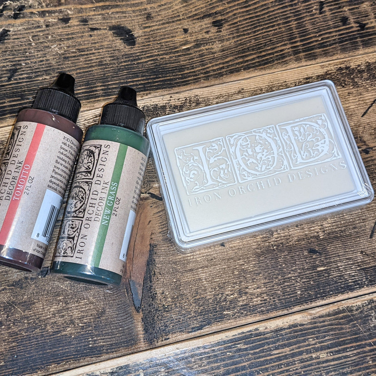 IOD Two Bottles of Ink and Uninked White Ink Pad set for use with IOD stamps.