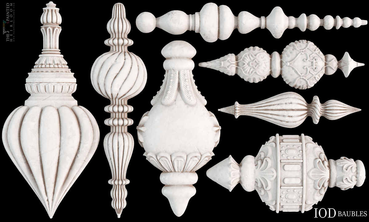 Eight ornate Baubles Moulds (2026 Limited Release) by IOD arranged on a black background.