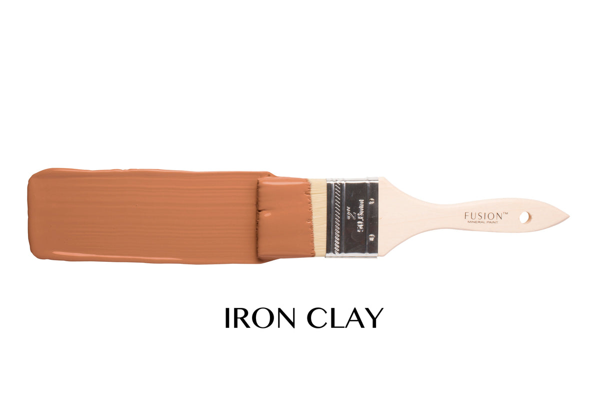 Fusion Mineral Paint brush, Iron Clay color, displayed on a white background.