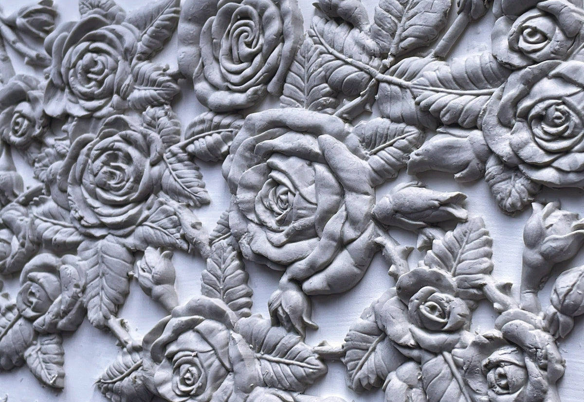 Gray clay rose and leaf relief made with Juliette Mould by I.O.D.
