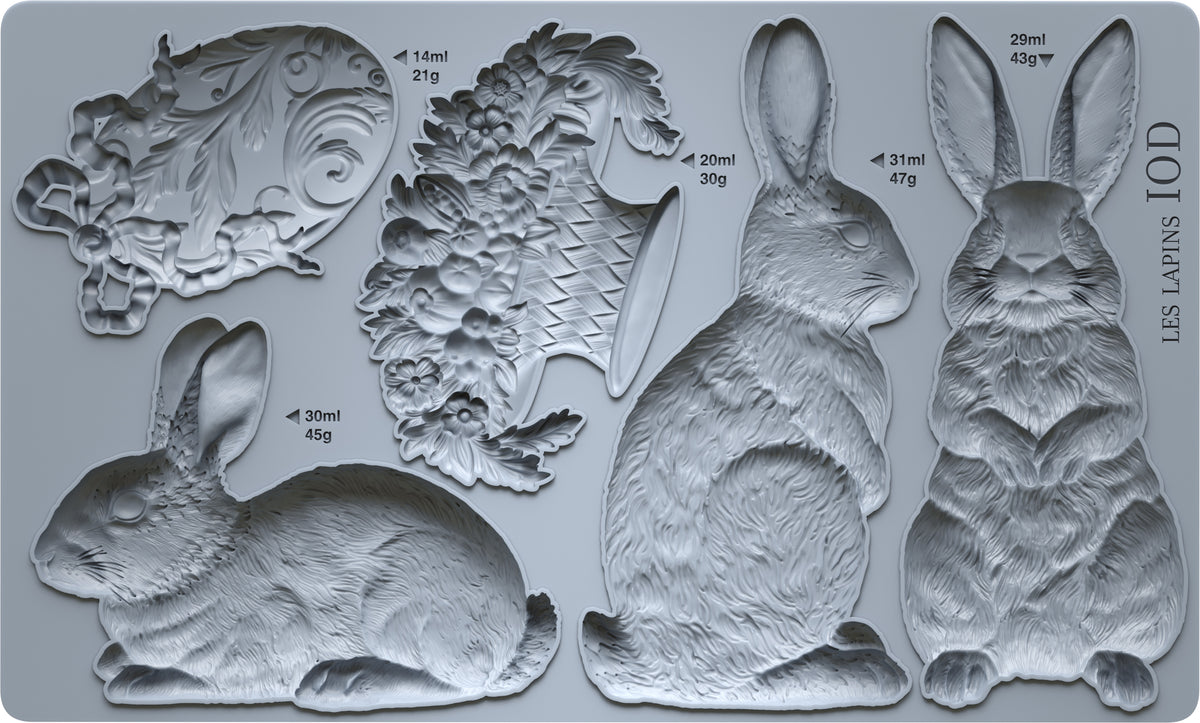 Six Les Lapins moulds by I.O.D., vintage garden and French-inspired shapes, set of six.