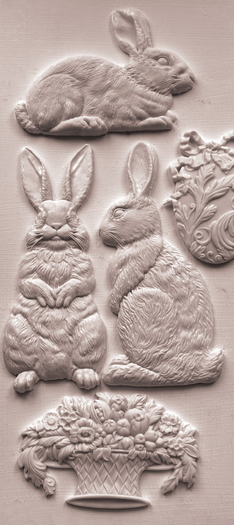 Les Lapins Mould by IOD with four embossed rabbits and a floral basket in vintage garden art style.