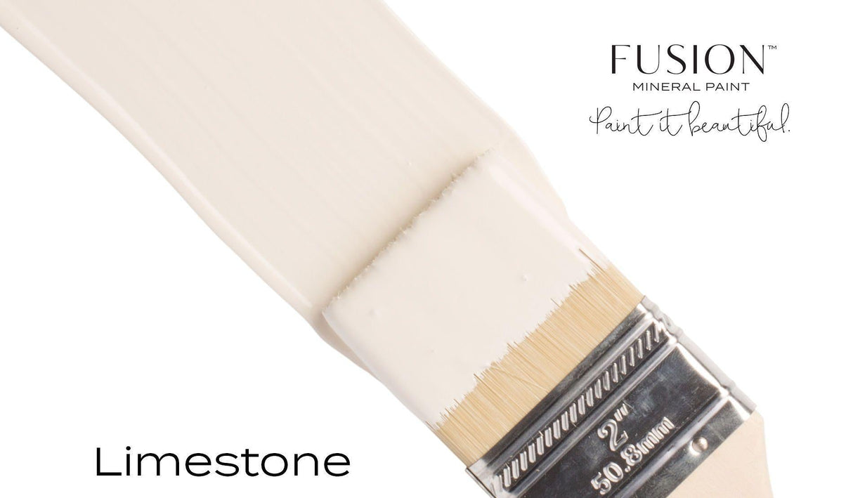 Brush with off-white, matte Limestone Fusion Mineral Paint; Fusion Mineral Paint logo in top right corner.