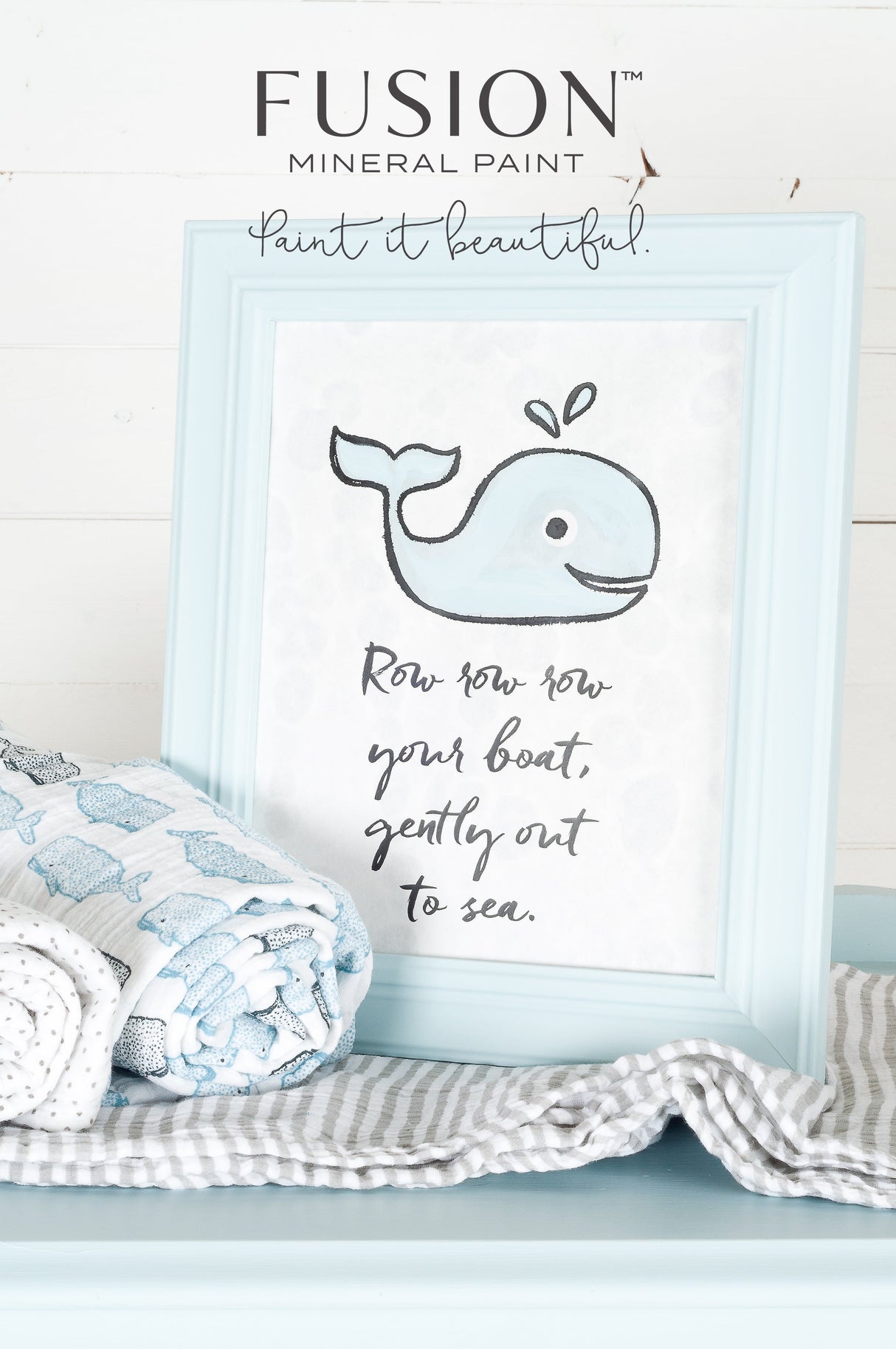 Framed print featuring a smiling blue whale in Little Whale Fusion Mineral Paint with “Row row row your boat” text.