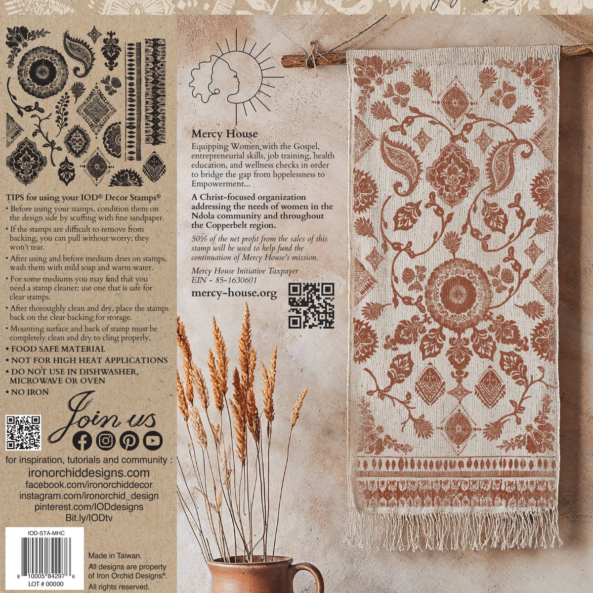 Wall hanging with brown geometric floral pattern made with I.O.D. Mercy House Chitenge Stamp.