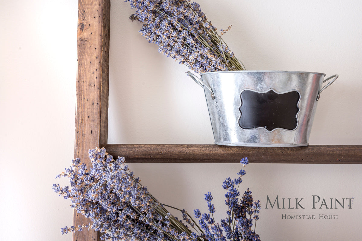 Fusion Mineral Paint Milk Paint Wood Stain bucket, shelf-ready for furniture restoration projects.