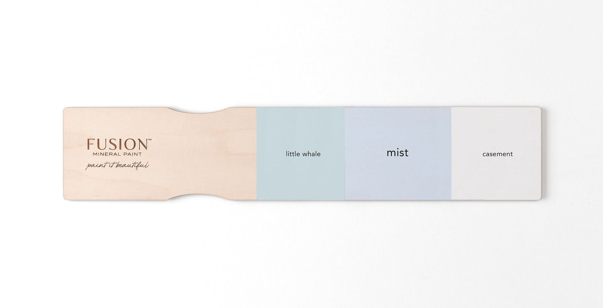 Wooden stir stick with matte samples of Little Whale, Mist Fusion Mineral Paint, and Casement by Fusion.