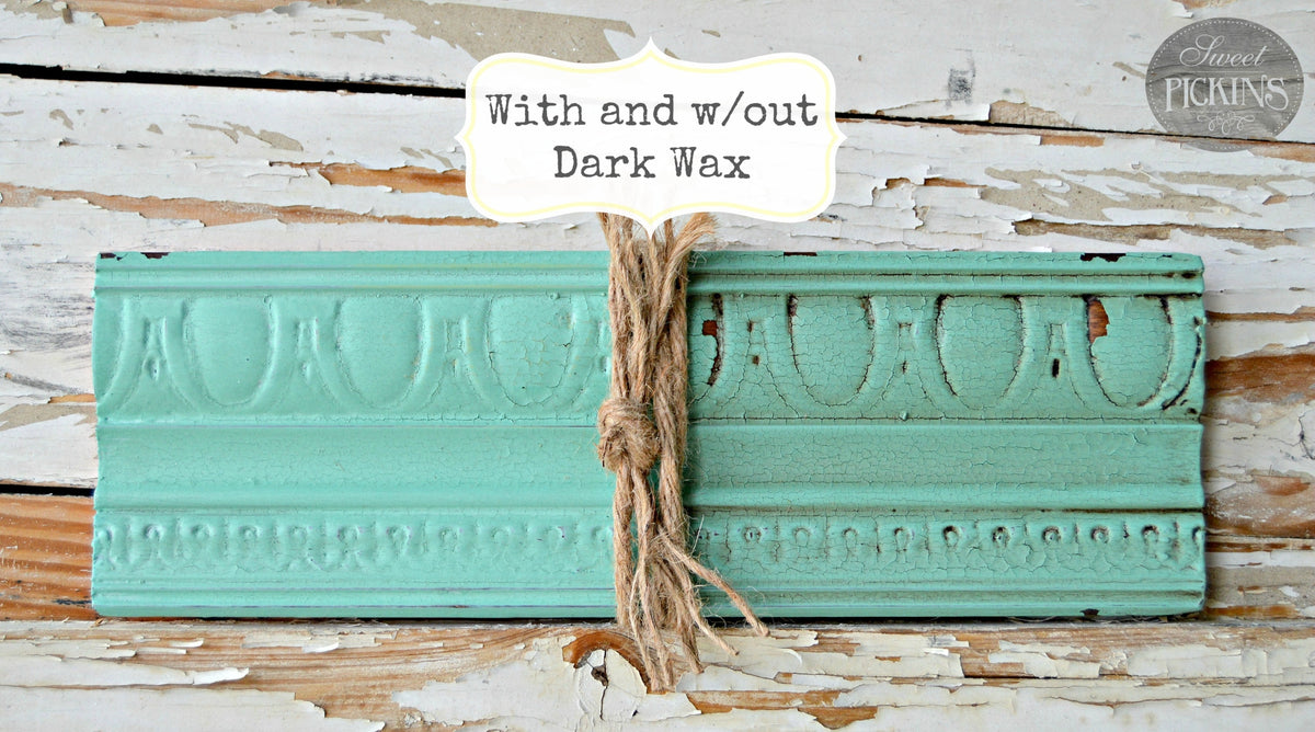 Sweet Pickins Milk Paint wood trim sample by Old Fashioned Milk Paint, showing dark-waxed and unwaxed sections with twine.