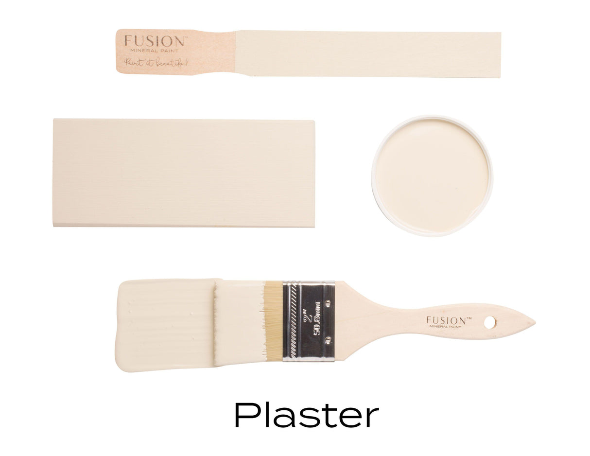 Two beige sample boards, a can of Plaster Fusion Mineral Paint, and a brush labeled Plaster matte finish.