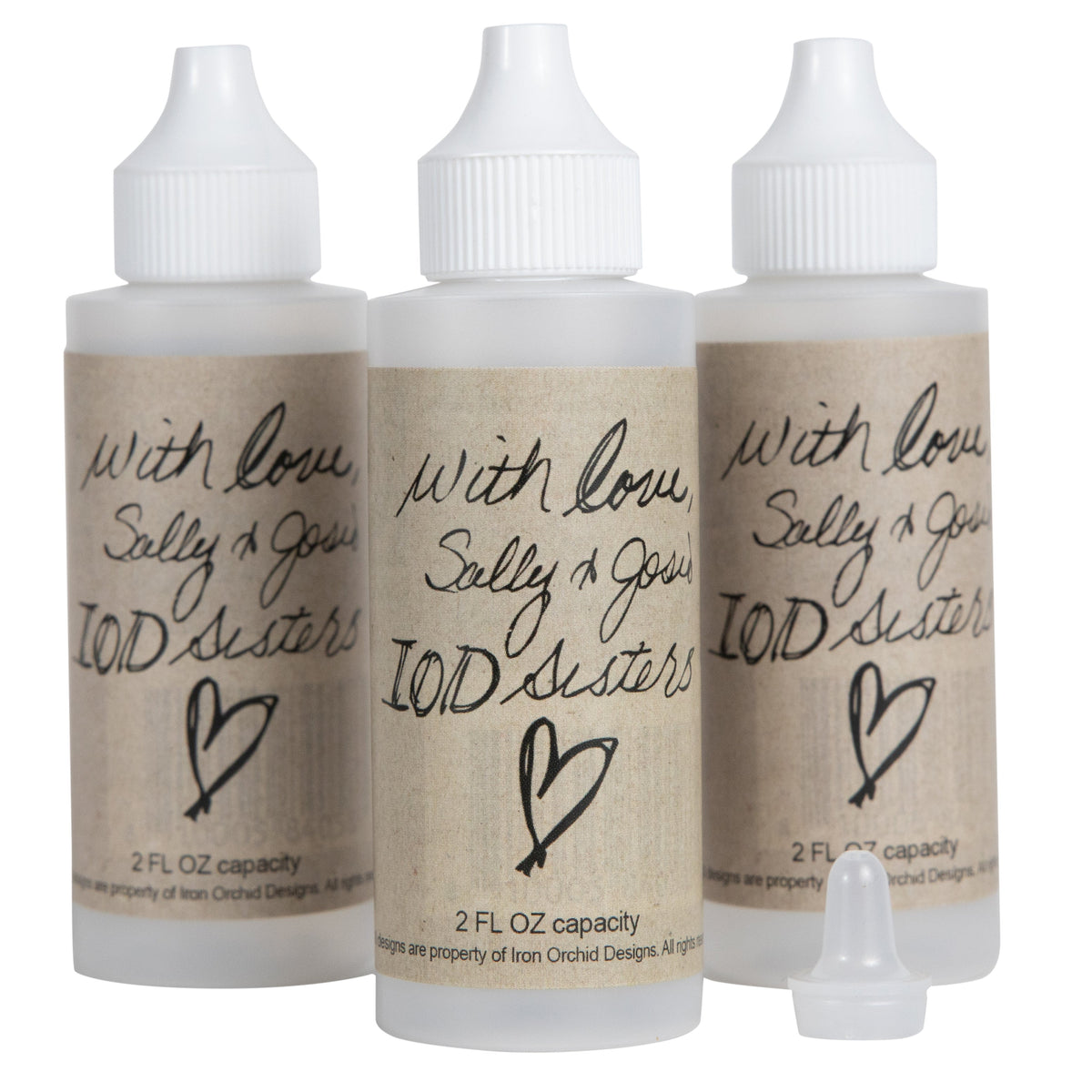 Set of three 2oz IOD refillable mixing bottles with handwritten-style “IOD Sisters” labels by Iron Orchid Designs.
