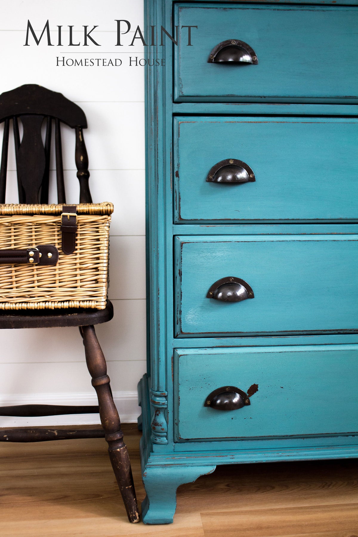 Renfrew Blue Milk Paint dresser by Homestead House with black handles on wooden flooring.