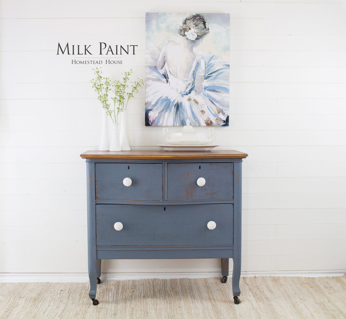 Blue dresser in Rideau Blue Milk Paint by Homestead House with white knobs.