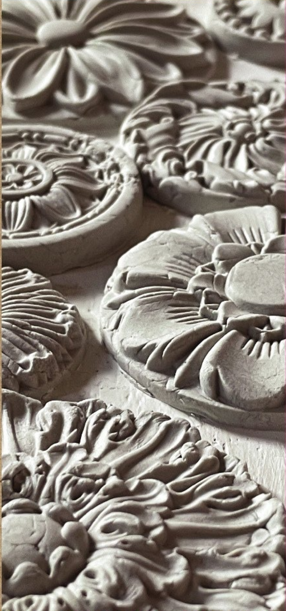 I.O.D. Rosettes Mould plaster medallions featuring detailed floral patterns by Iron Orchid Designs.