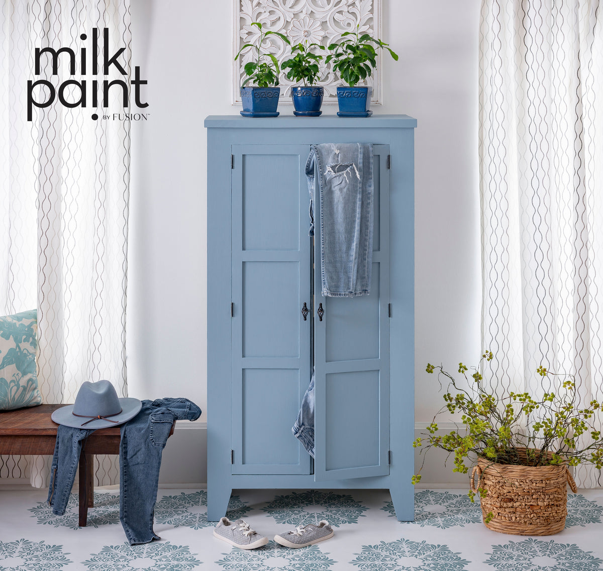 Wardrobe painted in Fusion Mineral Paint’s Skinny Jeans, filled with clothes and shoes.