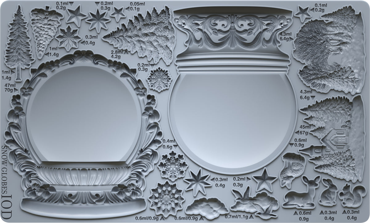 IOD Snow Globes Mould (2025) by I.O.D. with tree, animal, and star designs; labeled in ml and grams.