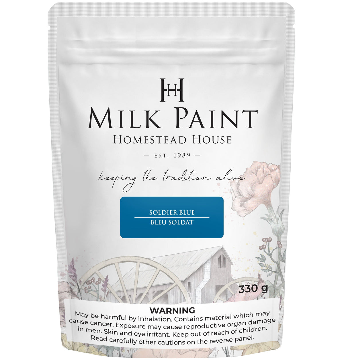 Homestead House Soldier Blue Milk Paint 330g bag with floral and wagon wheel design, includes warning label.