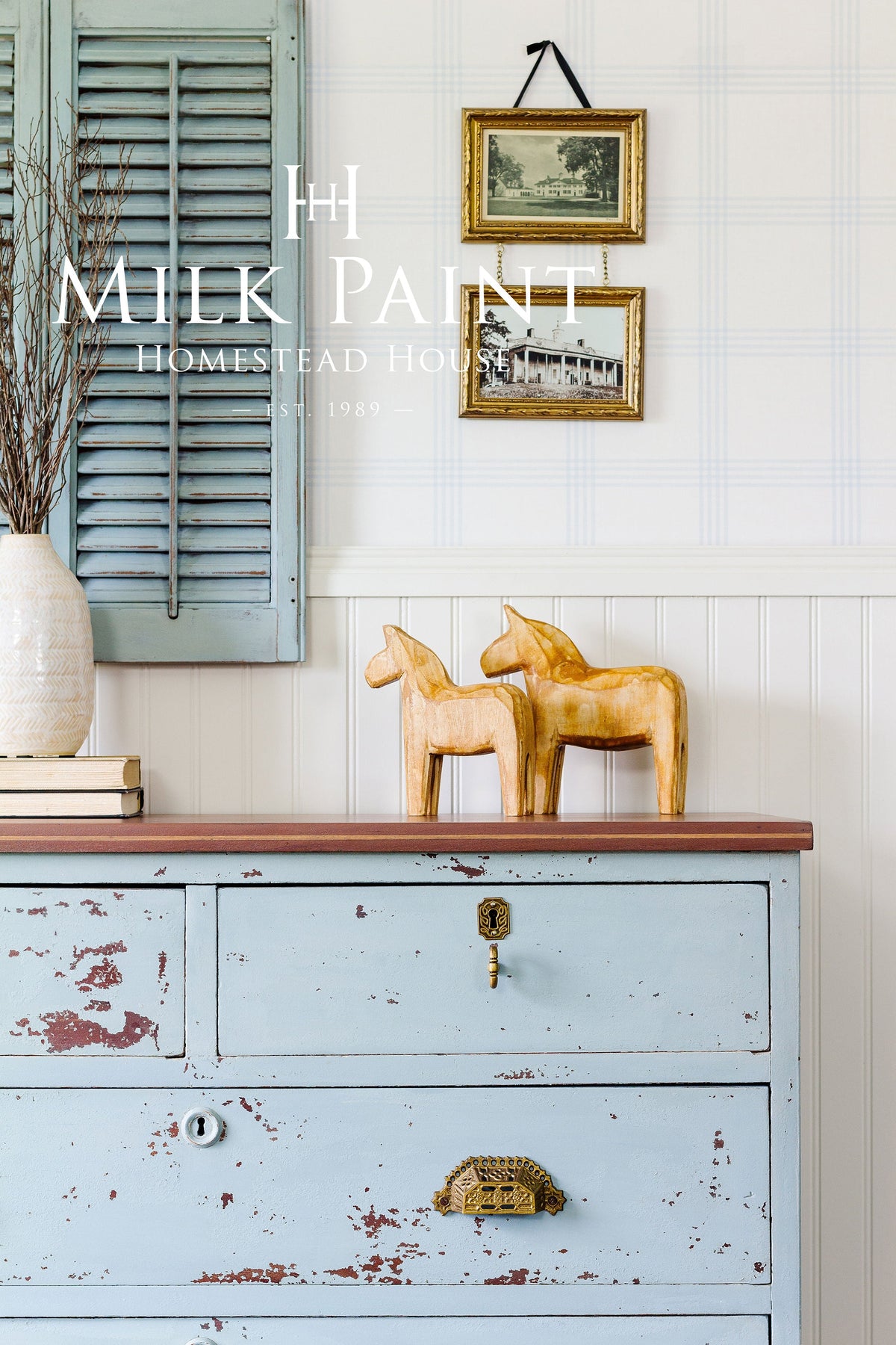 Dresser in Solstice Blue Milk Paint by Homestead House with gold handles.