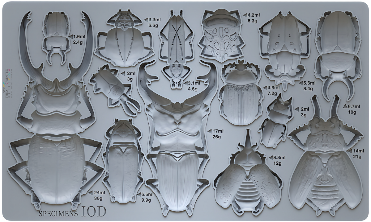 I.O.D. Specimens Mould with 18 insect-shaped cavities, each marked with ml/g measurements.