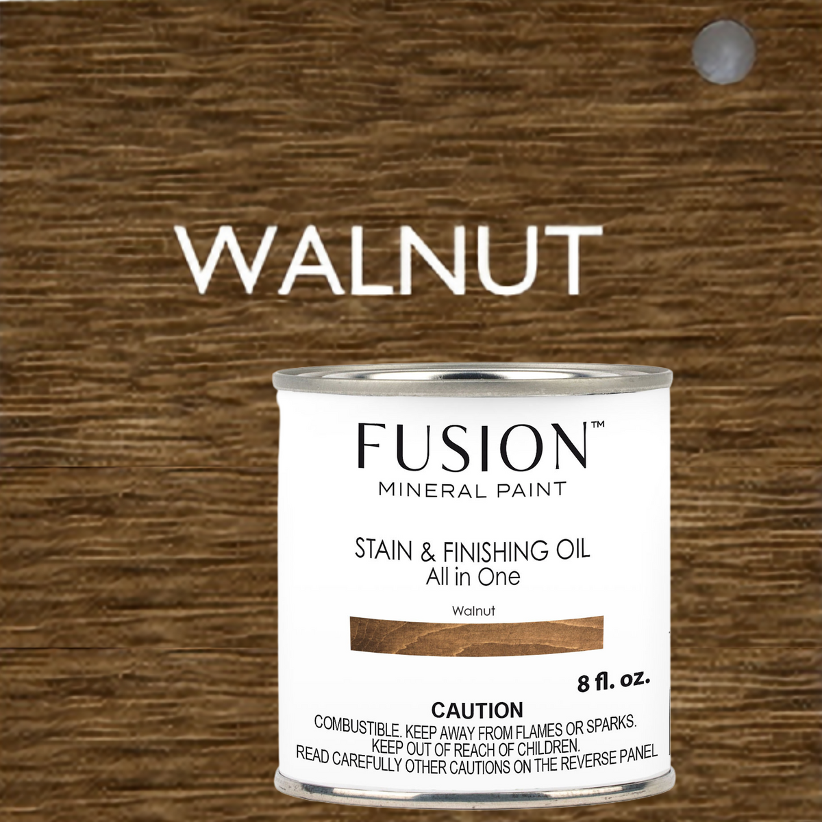 Fusion Mineral Paint Stain & Finishing Oil displayed in front of walnut wood.
