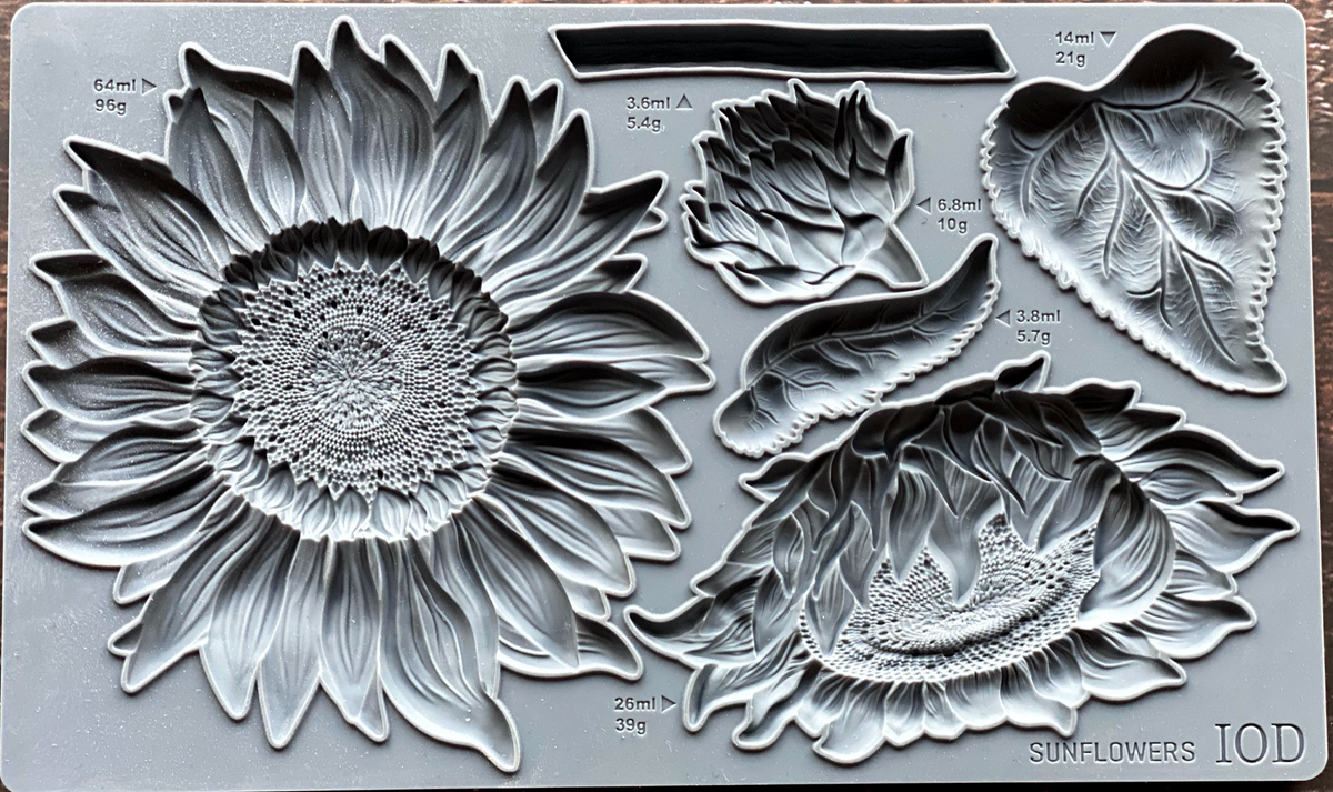 IOD Sunflowers Mould with sunflower, leaf, and petal shapes for use with I.O.D. Air Dry Clay.