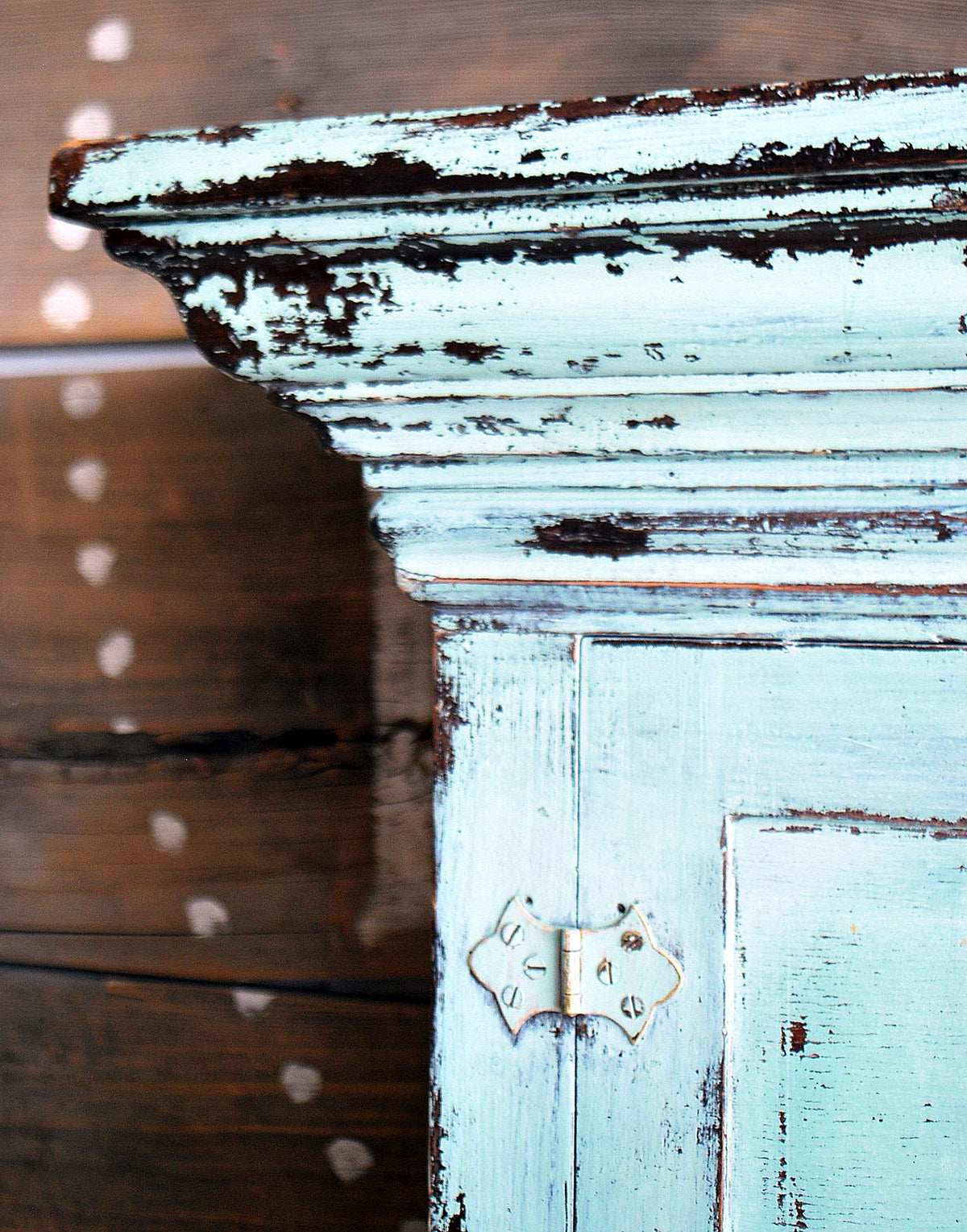 Distressed light blue cabinet finished with Sweetie Jane by Old Fashioned Milk Paint.
