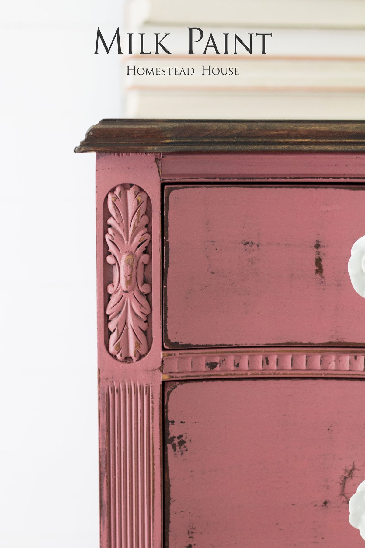 Distressed pink dresser with ornate details, finished with Homestead House Texas Rose Milk Paint.