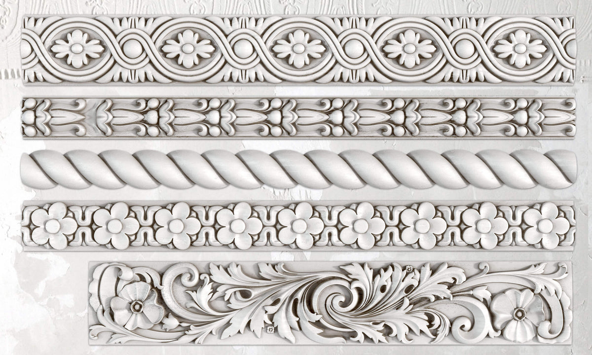 Five white plaster trims crafted with IOD Trimmings 2 Mould by I.O.D., displayed against a white background.