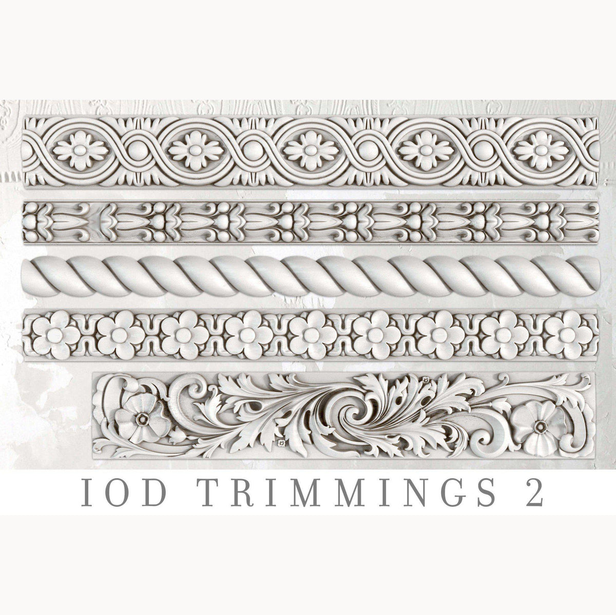 Five trims crafted using I.O.D. Trimmings 2 Moulds arranged in a row; text reads “I.O.D. Trimmings 2 Mould.”.