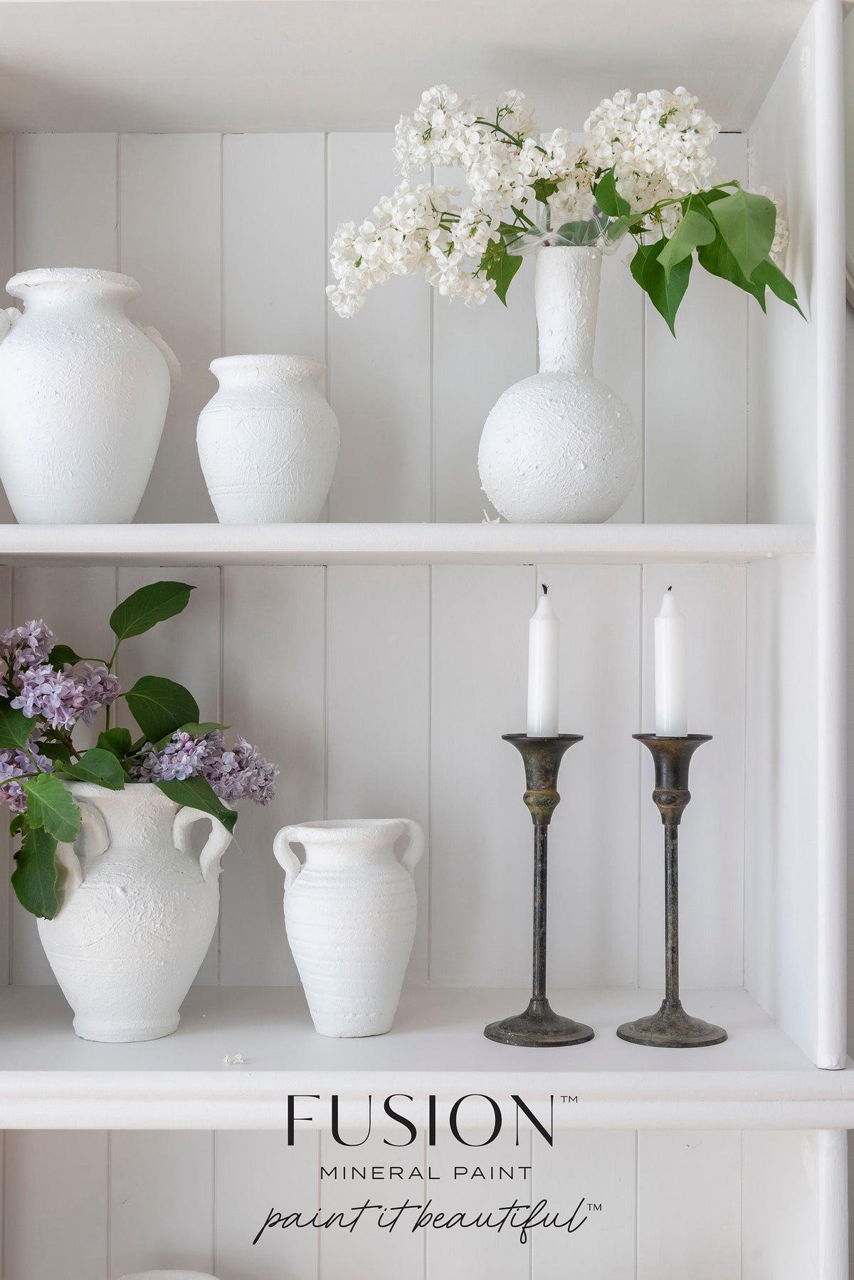 White vases, flowers, and brass candlesticks on Fusion Mineral Paint Victorian Lace layered white background.