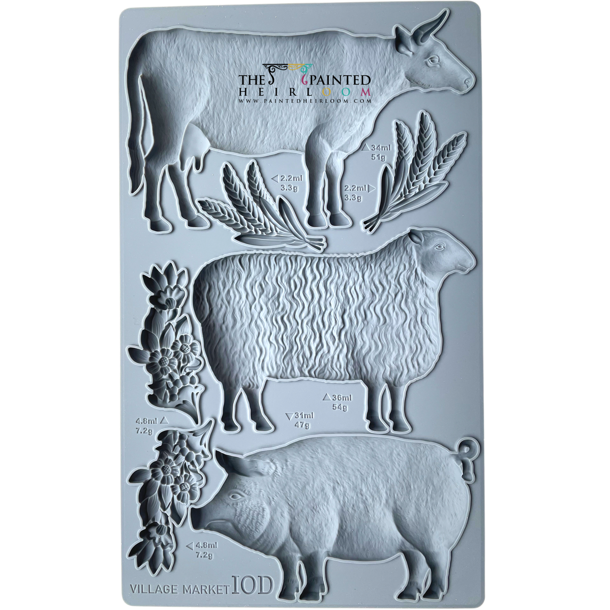 Village Market Mould by I.O.D. with farm animals, plants, and volume labels in durable silicone.