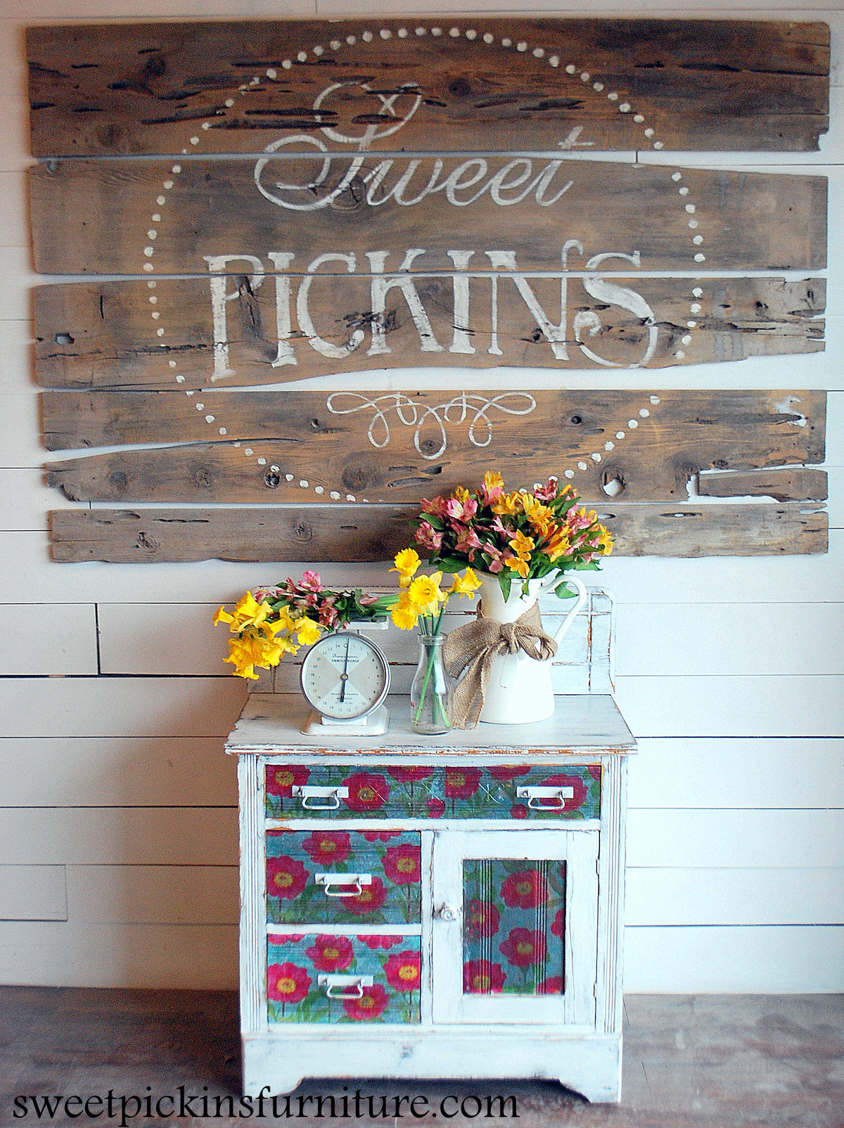 A Window Pane – Sweet Pickins Milk Paint sign by Old Fashioned Milk Paint displayed above a cabinet.