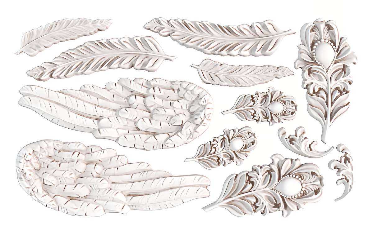 I.O.D. Wings and Feathers Mould (Retired) by Iron Orchid Designs showing wing, feather, and floral details.