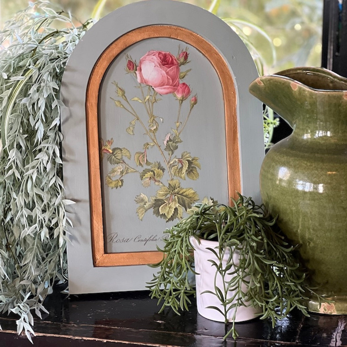Framed rose art with green pitcher and plants on I.O.D. Wood Gallery Blank by Iron Orchid Designs.