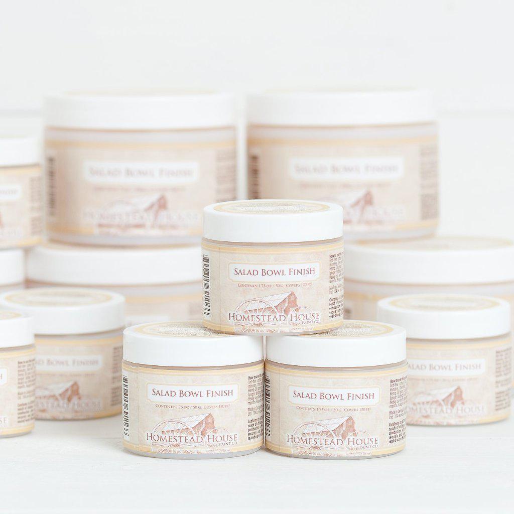 Rows of Fusion Mineral Paint Beeswax Salad Bowl Finish containers on a white surface.