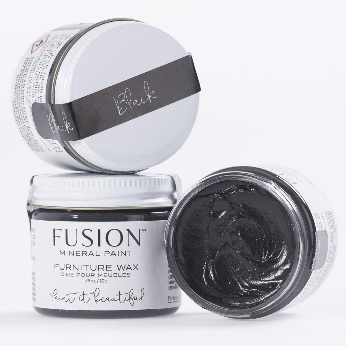 Three jars of Fusion Mineral Paint Black Furniture Wax, one open showing the black wax inside.